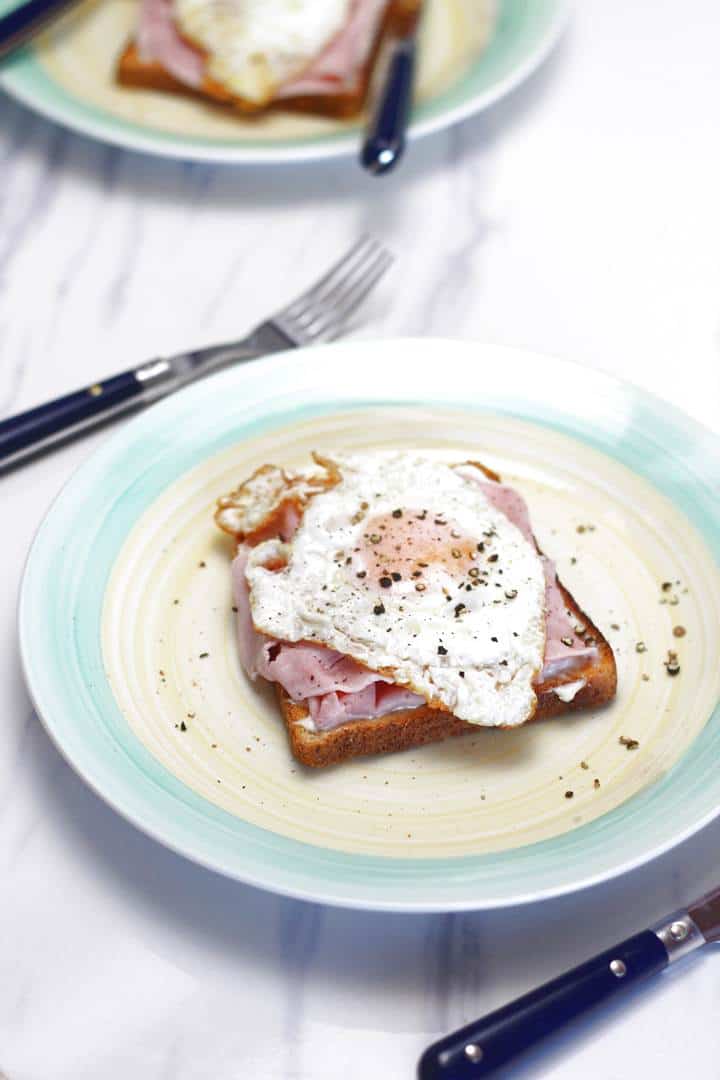 over easy eggs and ham on Hellman's toast