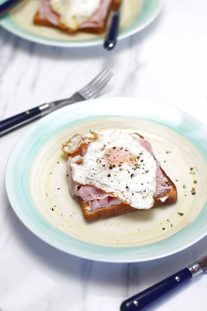 over easy eggs and ham on Hellman's toast