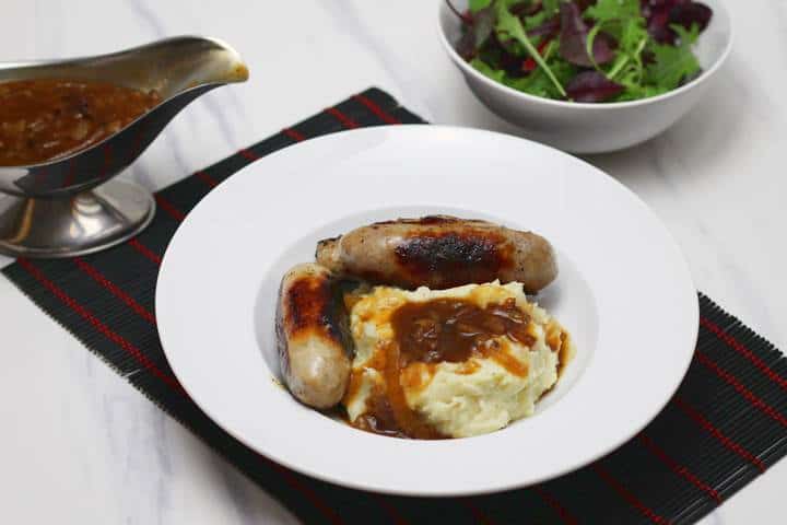 Bangers and mash with onion gravy