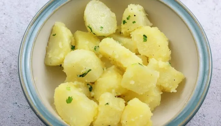 butter potatoes on stove